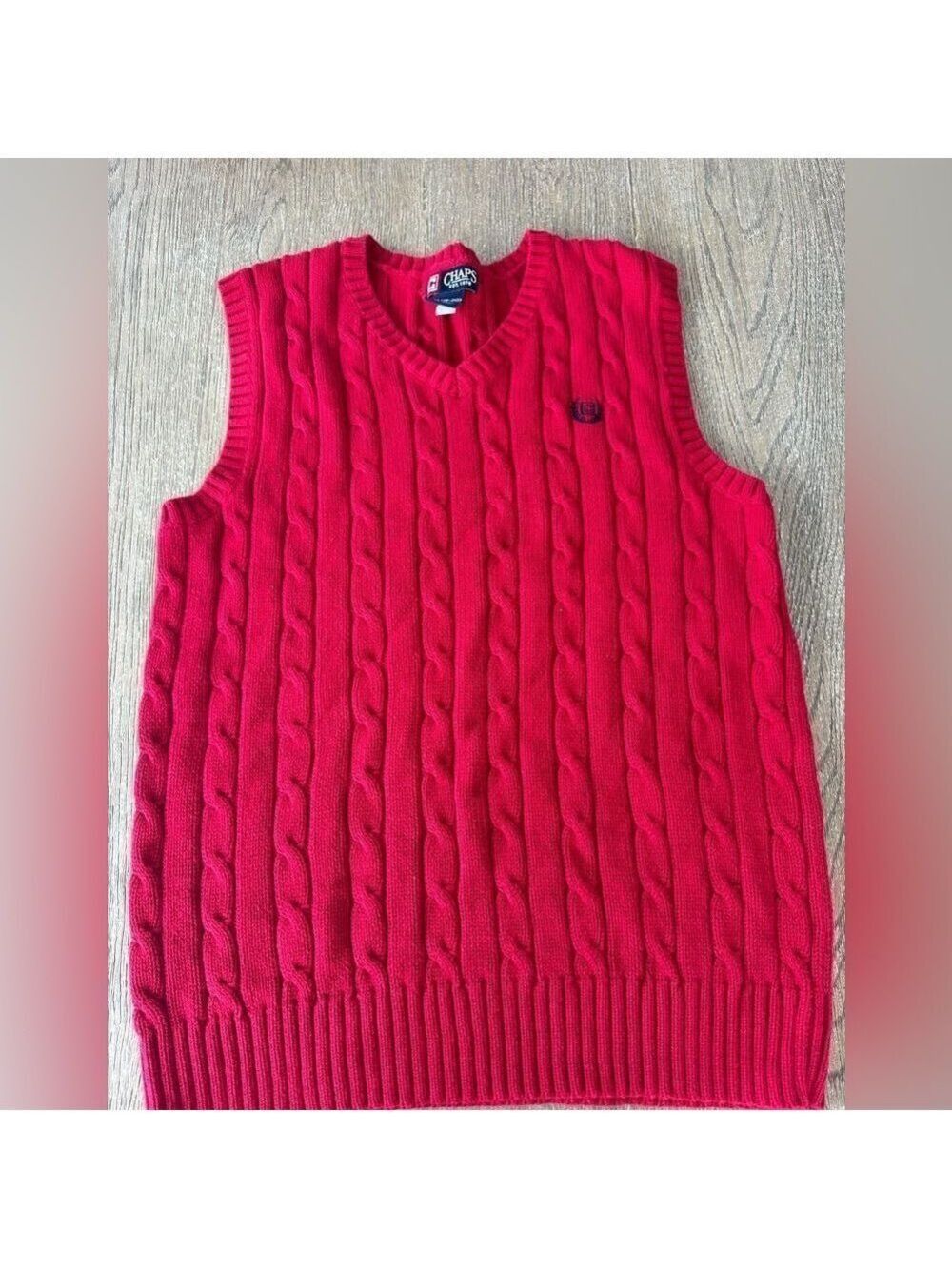 Chaps red vest.